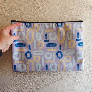abstract lilac groovy patterned pouch