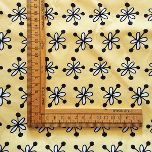 sunny fabric design with floral motif